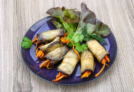 Eggplant rolls with carrot served spices and corianderの写真素材
