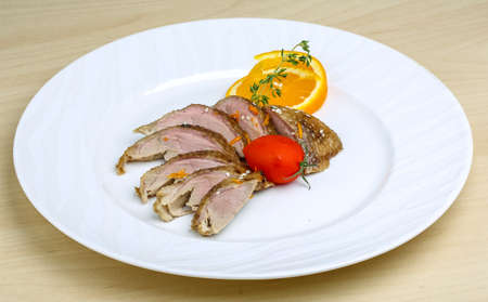 Roasted duck breast with orange and sesame seedsの写真素材
