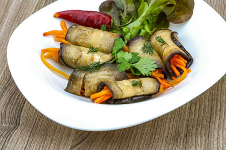 Eggplant rolls with carrot served spices and corianderの写真素材