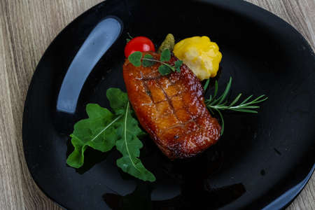 Roasted duck breast with rosemary and rucolaの写真素材