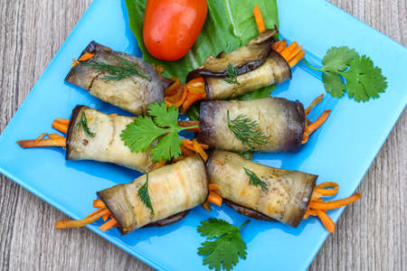 Eggplant rolls with carrot served spices and corianderの写真素材