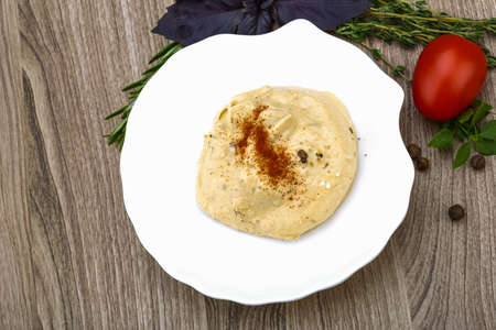 Arabic traditional cusine - hummus with olive oil, herbs and spicesの写真素材