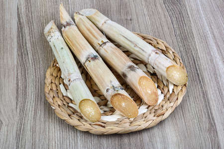 Ripe Sugar sticks on the wood backgroundの写真素材