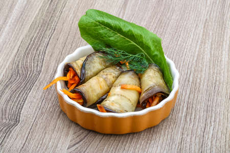 Eggplant rolls with carrot served spices and corianderの写真素材