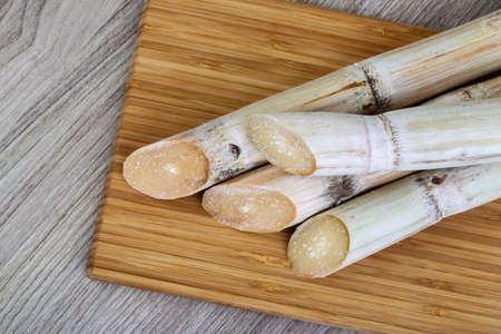 Ripe Sugar sticks on the wood backgroundの写真素材