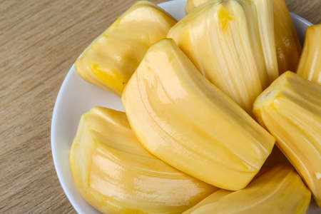 Tropical Jack Fruit on the wood backgroundの写真素材