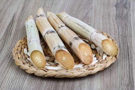 Ripe Sugar sticks on the wood backgroundの写真素材