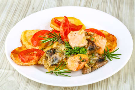 Salmon with grilled vegetables, rosemary and cheeseの写真素材