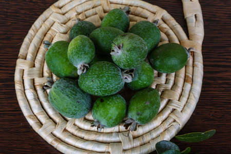 Fresh ripe sweet Feijoa fruit with leavesの写真素材
