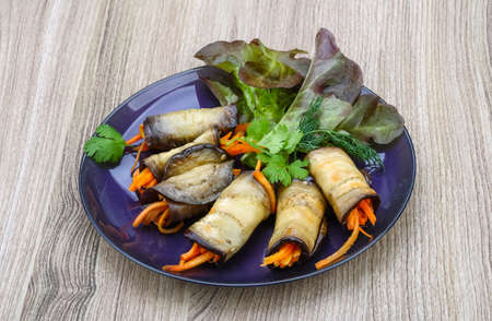 Eggplant rolls with carrot served spices and corianderの写真素材