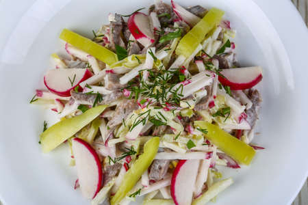 Salad with chicken and radish served green pepperの写真素材