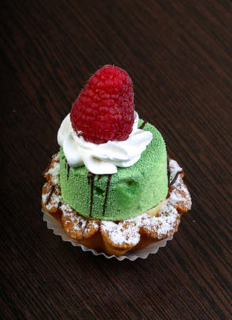 Sweet Pastry with berries on the wood backgroundの写真素材