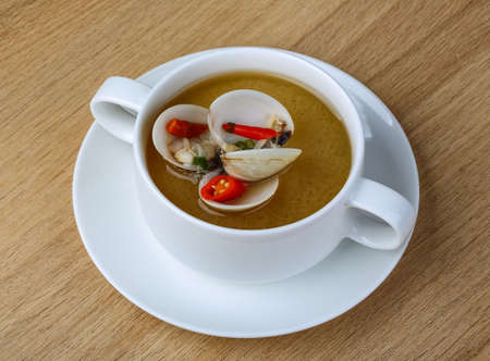 Asian traditional Shell soup on the wood backgroundの写真素材