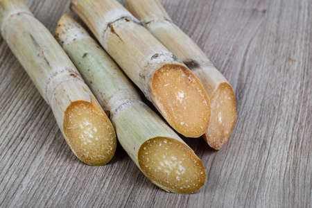 Ripe Sugar sticks on the wood backgroundの写真素材
