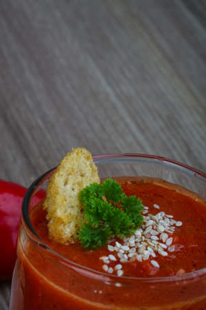 Spanish traditional soup - Gazpacho with croutons and parsleyの写真素材