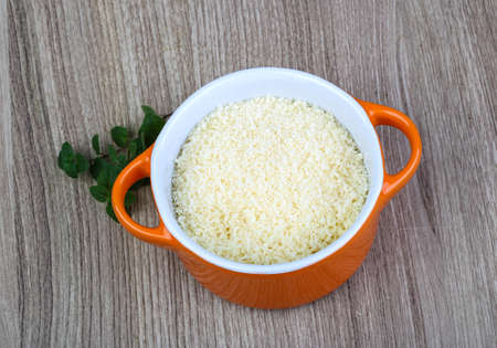 Shredded parmesan cheese ready for delicous cookingの写真素材