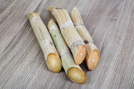 Ripe Sugar sticks on the wood backgroundの写真素材