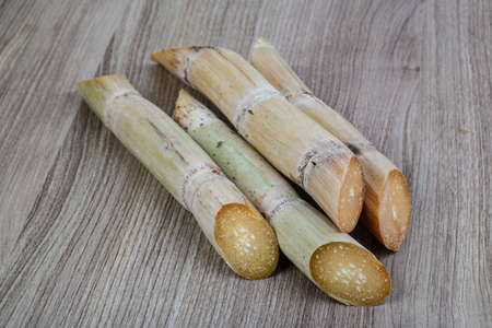 Ripe Sugar sticks on the wood backgroundの写真素材