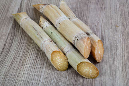 Ripe Sugar sticks on the wood backgroundの写真素材