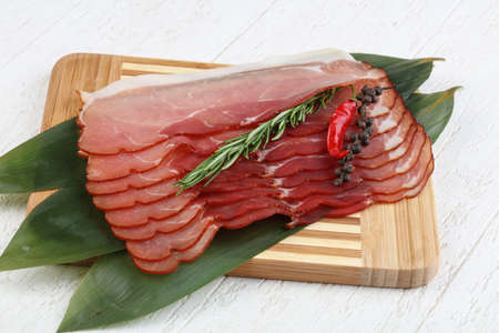 Famous Spain cuisine - pork Jamon with rosemary branchの写真素材