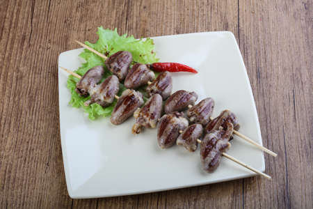 Chicken hearts skewer barbeque with herbs and spicesの写真素材