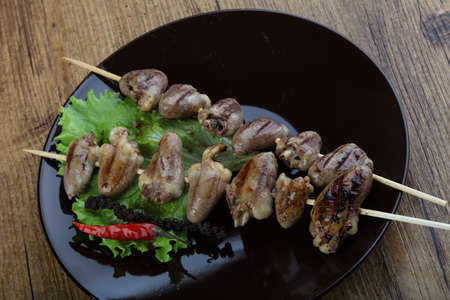 Chicken hearts skewer barbeque with herbs and spicesの写真素材