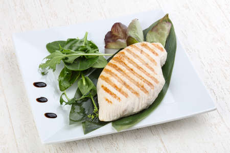 Grilled turkey steak with salad leavesの写真素材