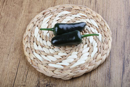 Jalapeno pepper on the wood backgroundの写真素材
