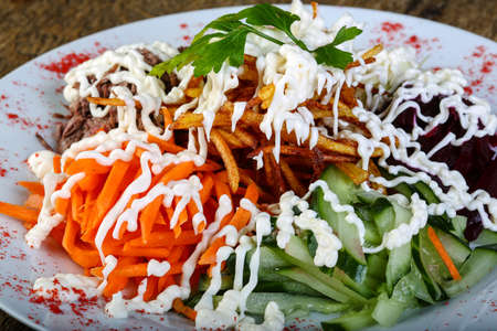 Beef and vegetables salad with mayonese sauce