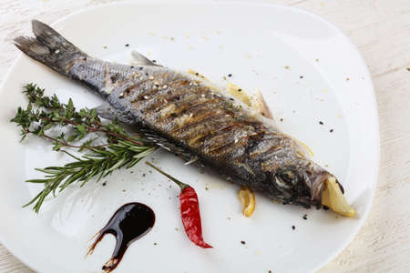 Grilled seabass with mustard, thyme and rosemary