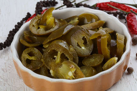 Picled mexican pepper Jalapeno in the bowlの写真素材