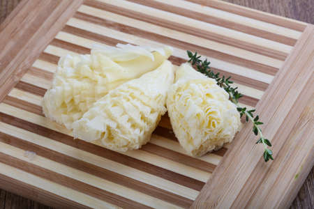 Cheese Tete de Moin with thyme branchの写真素材