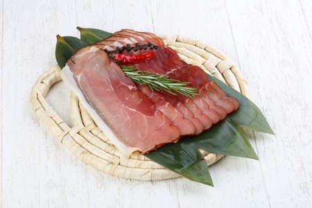 Famous Spain cuisine - pork Jamon with rosemary branchの写真素材