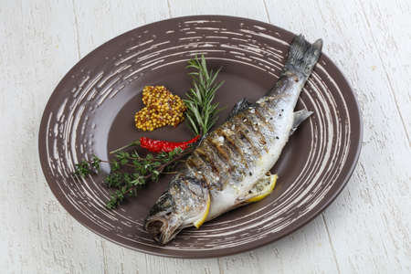 Grilled seabass with mustard, thyme and rosemaryの写真素材