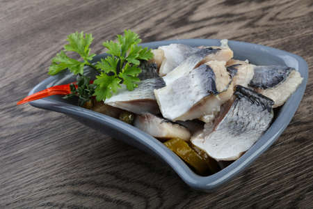 Herring fillet with capers, parsley and pepperの写真素材