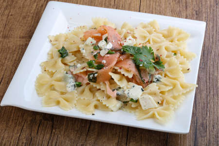 Pasta Farfalle with salmon and cheeseの写真素材