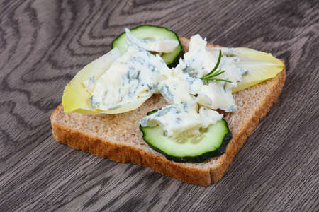 Sandwich with gorgonzola and fresh cucumberの写真素材