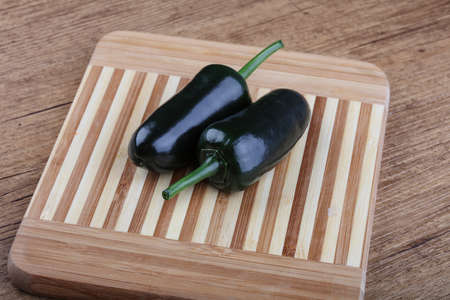 Jalapeno pepper on the wood backgroundの写真素材