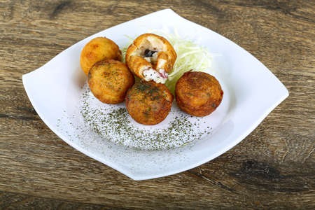 Japanese octopus balls with herbs and spices