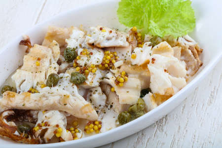 Baked fish with capers and mustard