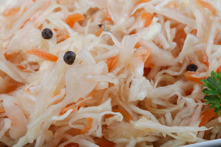 Fermented cabbage sauerkraut with carrot and pepperの写真素材