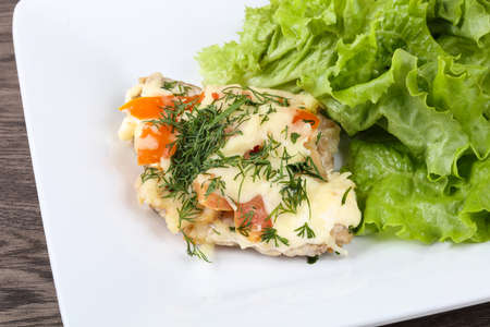 Meat covered cheese, mushrooms, dill and tomatoの写真素材