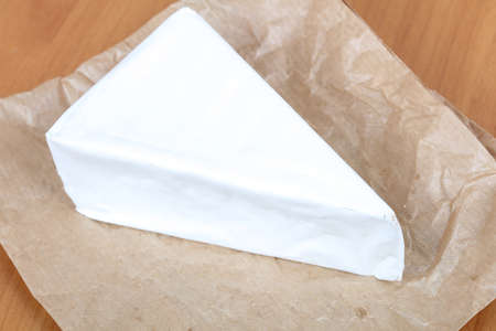 Brie cheese segment - ready for eatの写真素材