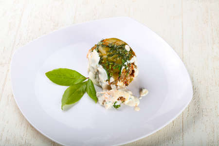 Stuffet pepper with cream sauce and parsleyの写真素材