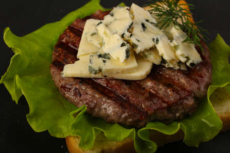 Sandwich with blue cheese and burger cutlet on blackの写真素材