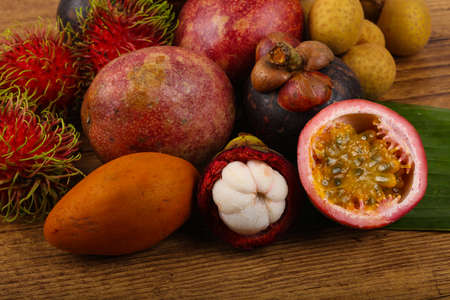 Tropical fruit mix - passionfruit, longan, mangosteen, rombutanの写真素材