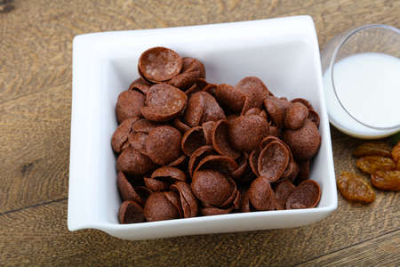 Choco corn flakes with milk and raisin