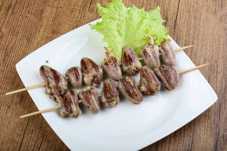 Chicken hearts skewer barbeque with herbs and spicesの写真素材