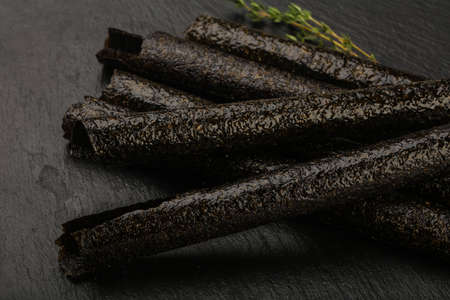 Asian cuisine - Nori chips over the wooden backgroundの写真素材
