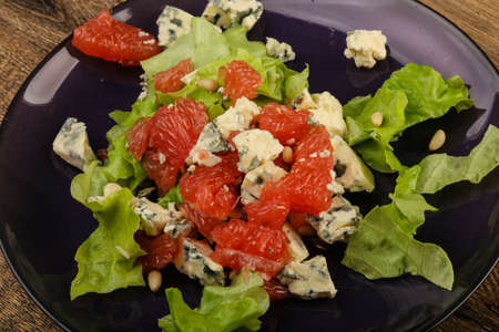 Grapefruit and blue cheese salad with cedar nutの写真素材